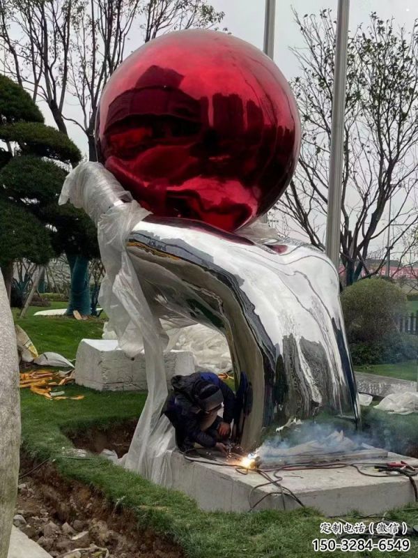 大型火球雕塑制造，透雕系列，手托火球雕塑承接
