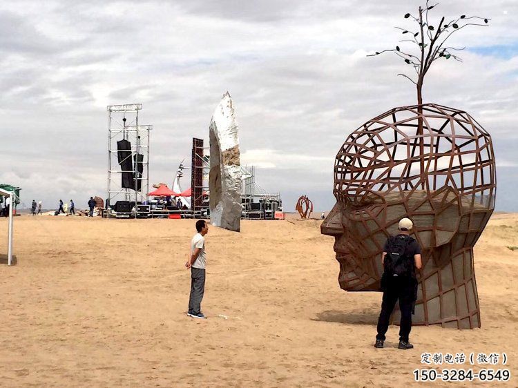 鏤空人頭像雕塑供應(yīng)，城區(qū)小品，鐵藝人頭像雕塑制造商