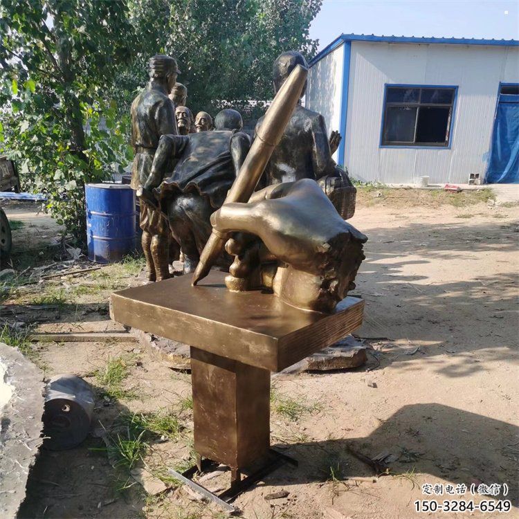 玉林手握鋼筆雕塑，街道標(biāo)識(shí)，玻璃鋼手握鋼筆雕塑廠家